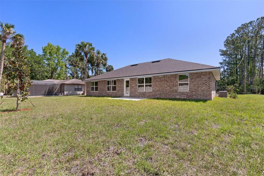 Exterior details and patio area of a home in Palm Coast, Palm Coast (Image 3).