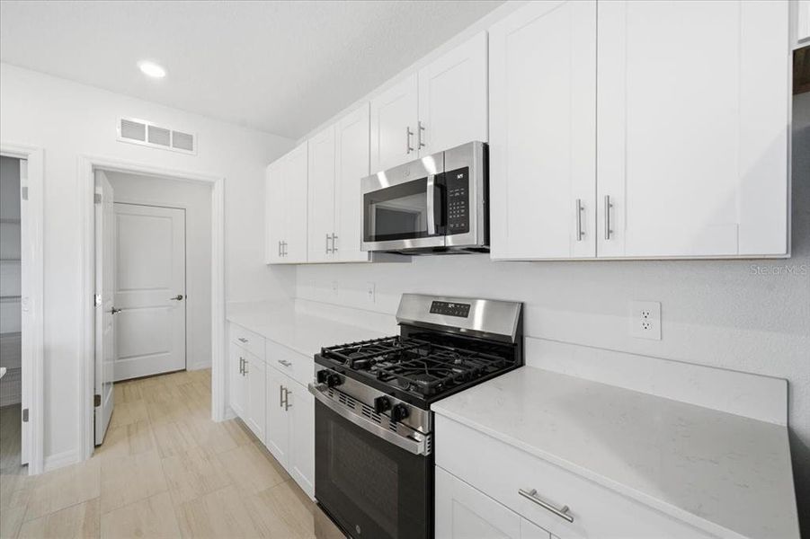 Furnished interior view inside a new home in Two Rivers: The Manors II, Zephyrhills (Image 7). Furnished interior view inside a new home in Two Rivers: The Manors II, Zephyrhills (Image 7).