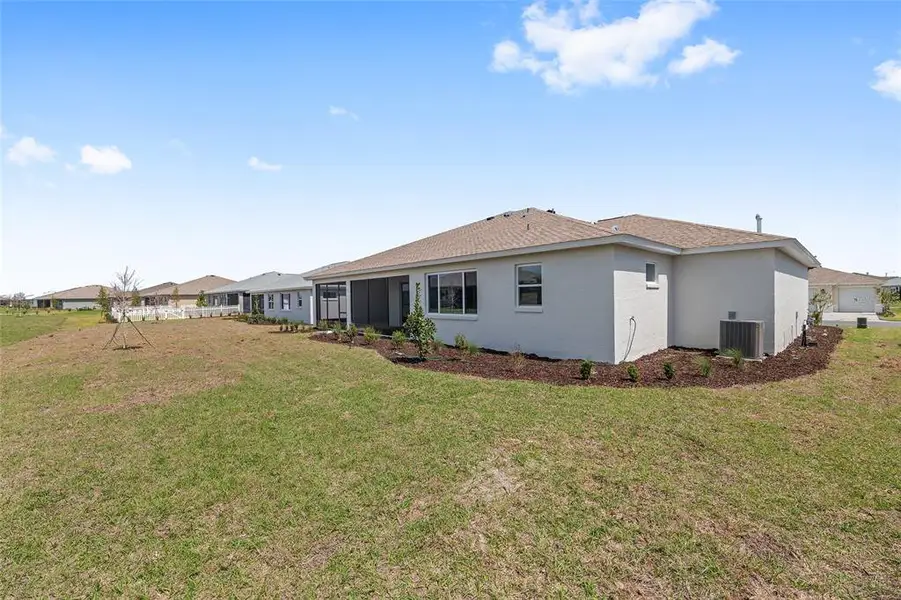Exterior details and patio area of a home in , Ocala (Image 37).