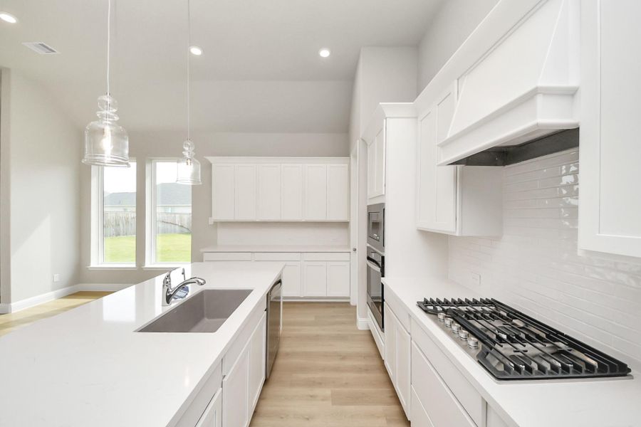 Furnished interior view inside a new home in Bridgeland: Heritage Collection, Cypress (Image 8). Furnished interior view inside a new home in Bridgeland: Heritage Collection, Cypress (Image 8).