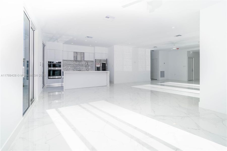 Spacious, unfurnished interior of a new home in , Miami (Image 10). Spacious, unfurnished interior of a new home in , Miami (Image 10).
