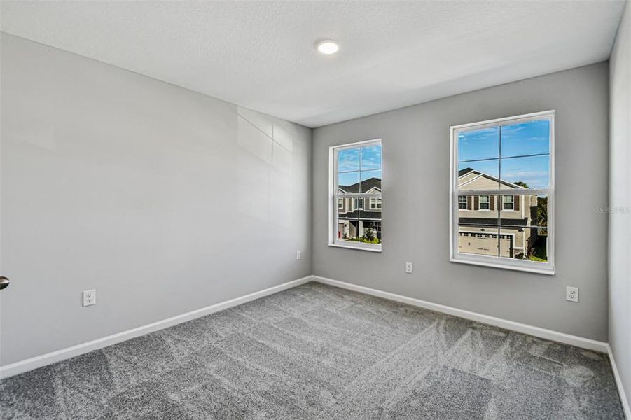 Spacious, unfurnished interior of a new home in Estates at Rivercrest, Sanford (Image 13).