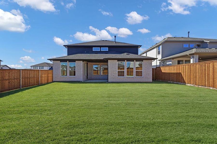 Exterior details and patio area of a home in Highland Lakes, McKinney (Image 3).