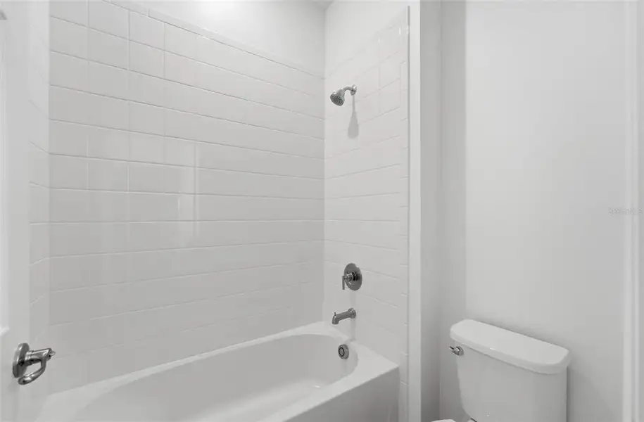 Furnished interior view inside a new home in Trinity Place, St. Cloud (Image 16).