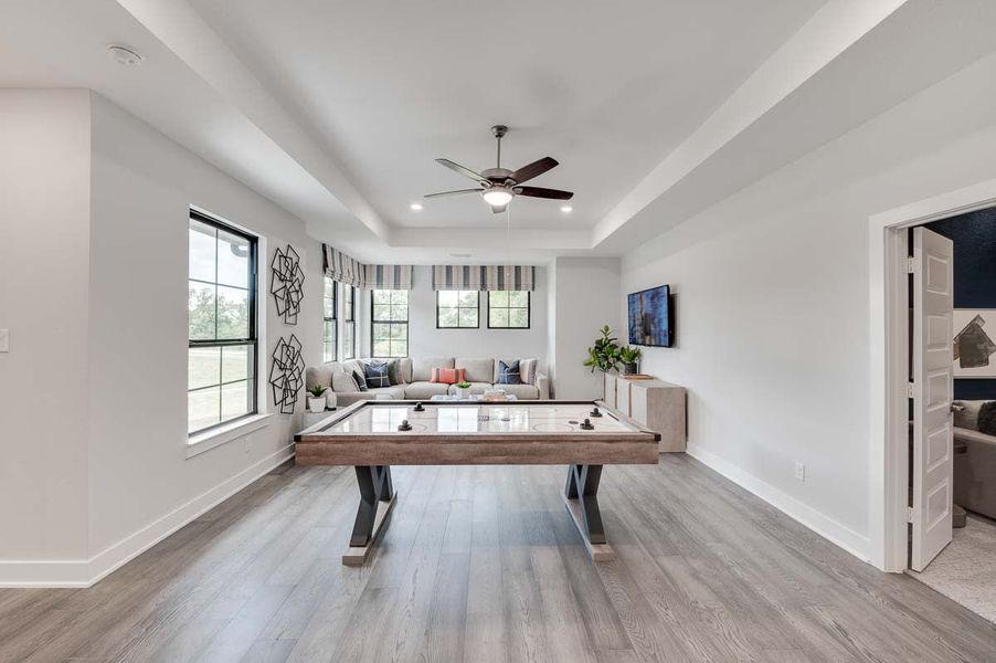 Representative furnished interior of a home built from the Verona by Tri Pointe Homes in Sienna 80′, Missouri City (Image 36).