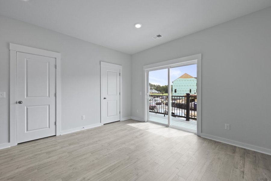 Spacious, unfurnished interior of a new home in Nexton, Summerville (Image 55).