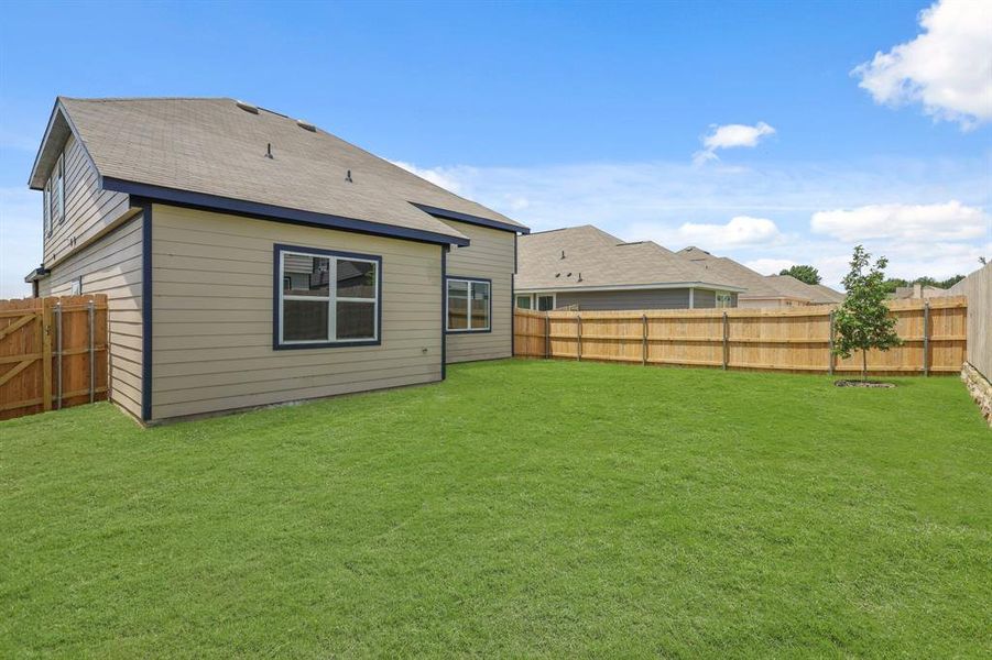 Front exterior of a new home in Sycamore Landing, Fort Worth, TX, highlighting curb appeal (Image 14).
