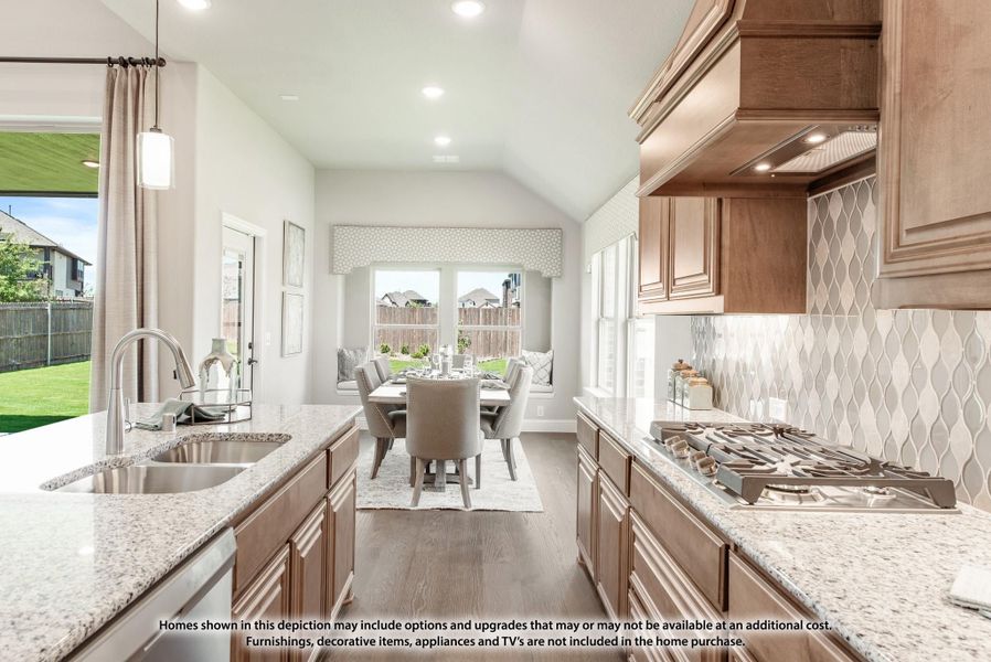 Kitchen with wood cabinets, granite countertops, gas cooktop, and dining area with breakfast nook in background Kitchen with wood cabinets, granite countertops, gas cooktop, and dining area with breakfast nook in background