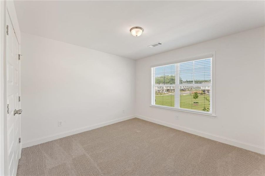 Spacious, unfurnished interior of a new home in Clark Farms, Flowery Branch (Image 17).