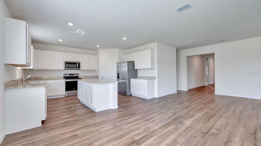 Furnished interior view inside a new home in , Haines City (Image 4).