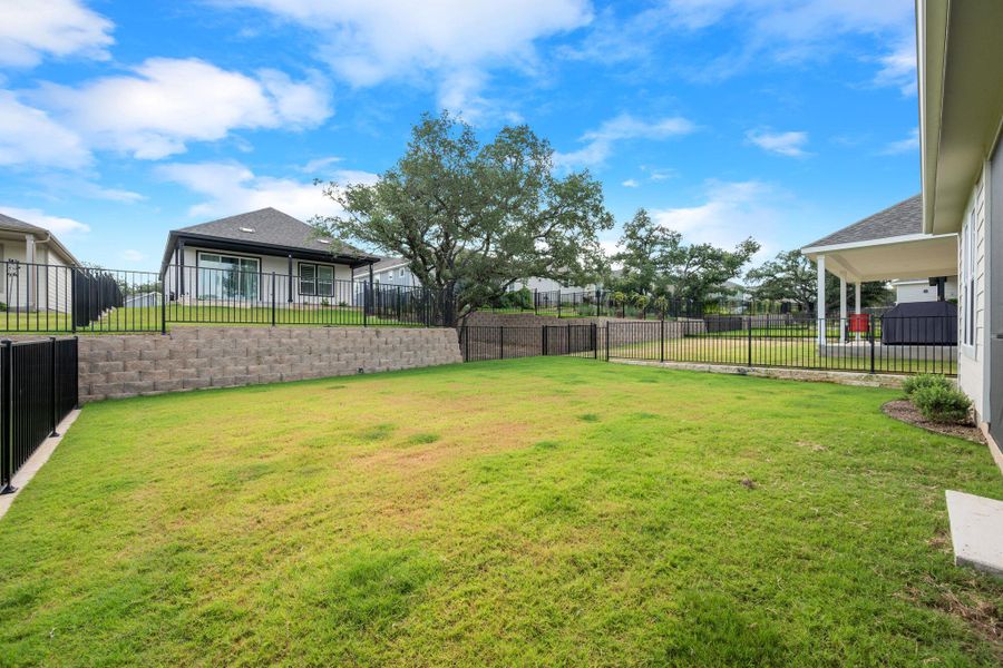 Front exterior of a new home in Sun City Texas, Georgetown, TX, highlighting curb appeal (Image 19).