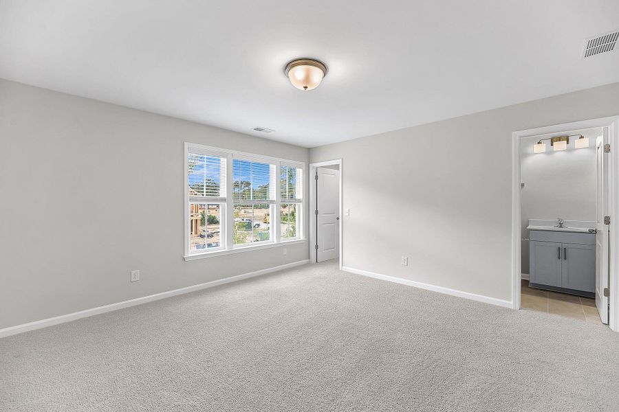 Spacious, unfurnished interior of a new home in Sweetgrass Station, Summerville (Image 23).