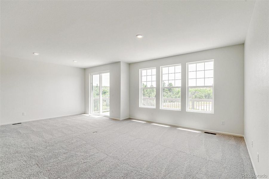 Spacious, unfurnished interior of a new home in Terrain Oak Valley, Castle Rock (Image 17).