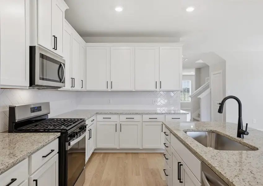 Yaupon - TX | Kitchen – Gas Range & Counter Detail