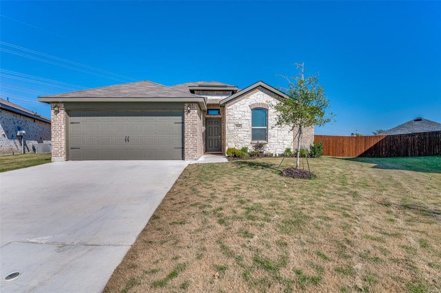 Front exterior of a home in the Brookville Ranch community, located in Fort Worth, TX (Image 3).