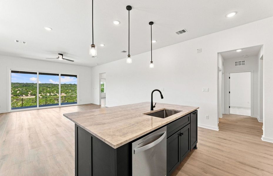 Representative furnished interior of a home built from the Elliott by Pulte Homes in West Cypress Hills, Spicewood (Image 15).