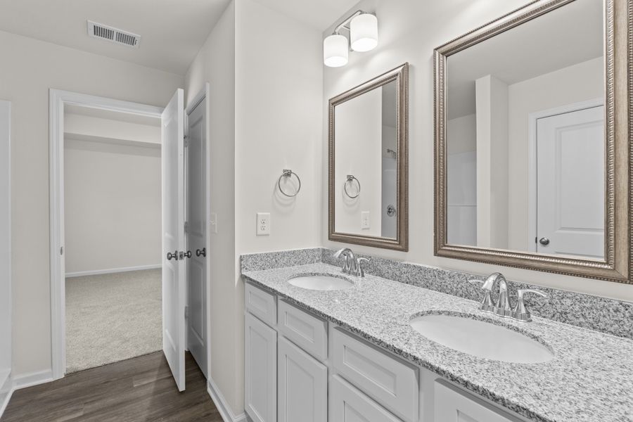 Representative furnished interior of a home built from the Cedar A by McGuinn Homes in Forts Ridge, Pelion (Image 9).