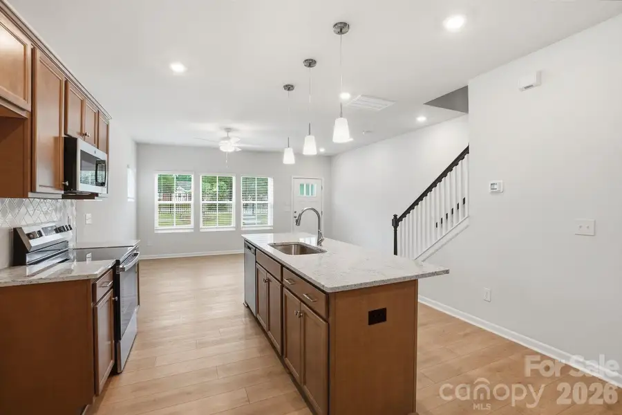 Furnished interior view inside a new home in Sloan Station, Charlotte (Image 7).