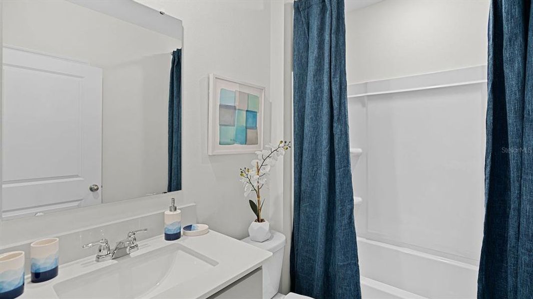 Furnished interior view inside a new home in Bradbury Creek, Haines City (Image 3).