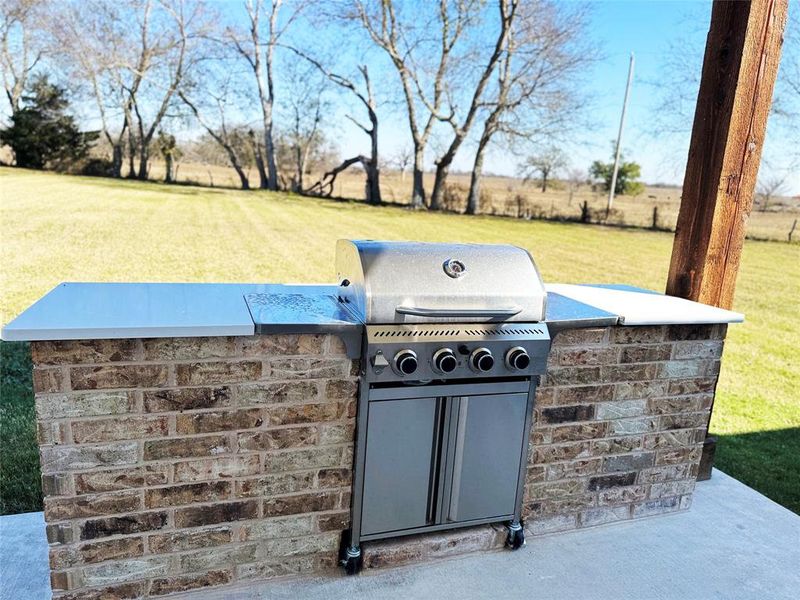 View of patio / terrace featuring exterior kitchen