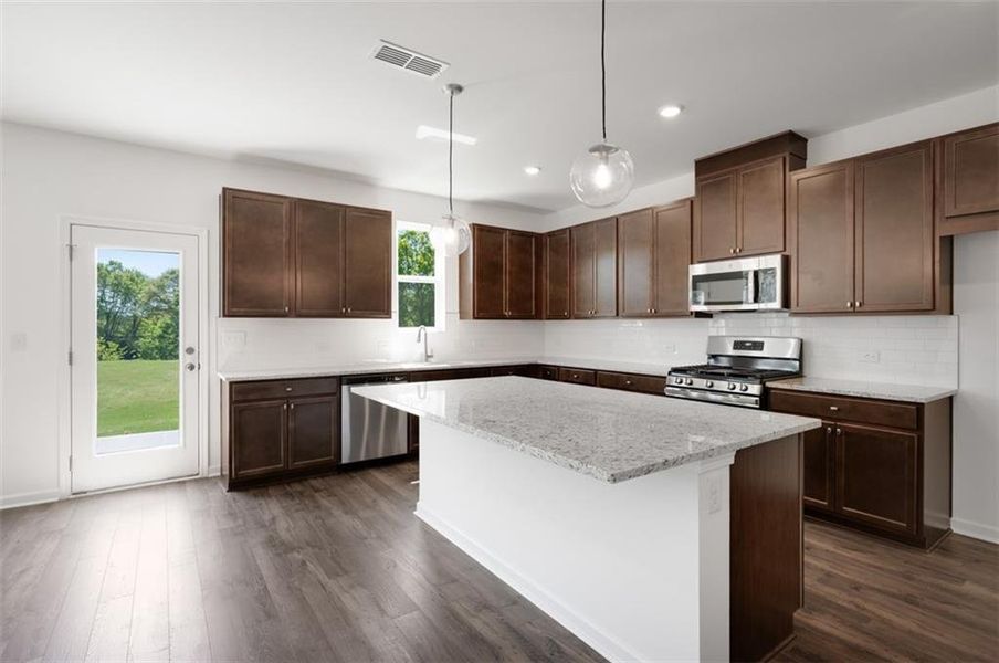 Furnished interior view inside a new home in Windance Lake, Loganville (Image 9).