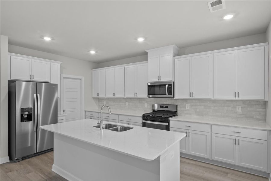 Furnished interior view inside a new home in The Farm at Wells Creek - Signature Collection, Gray Court (Image 8).