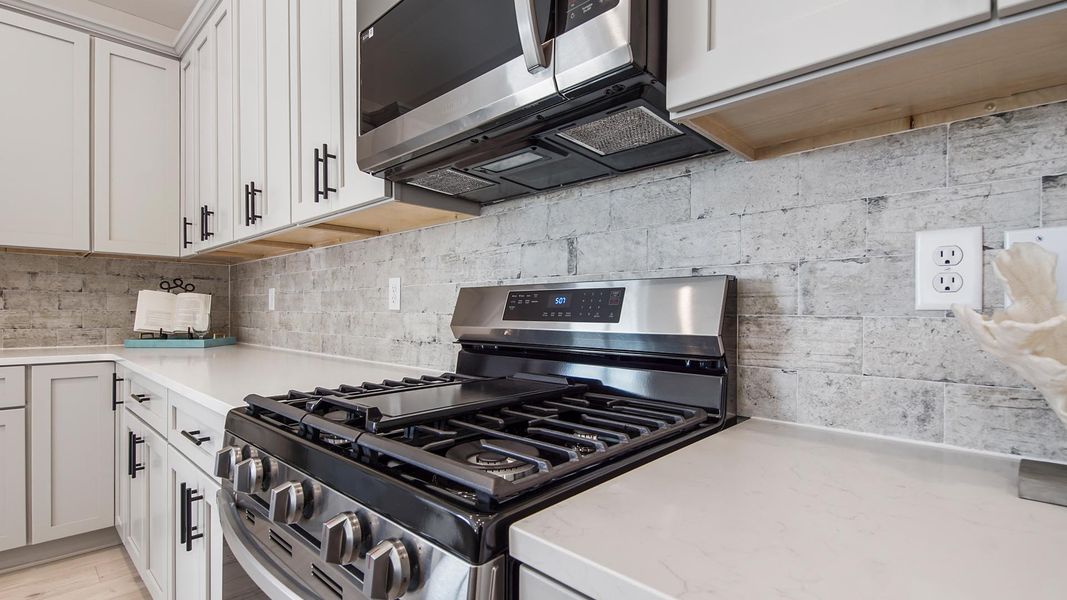 Furnished interior view inside a new home in Breakfast Point East Phase I, Panama City Beach (Image 6).