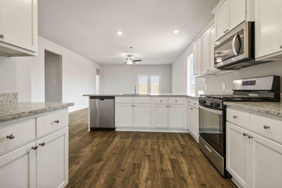 Furnished interior view inside a new home in Trails at Cochran Ranch, Waller (Image 5).