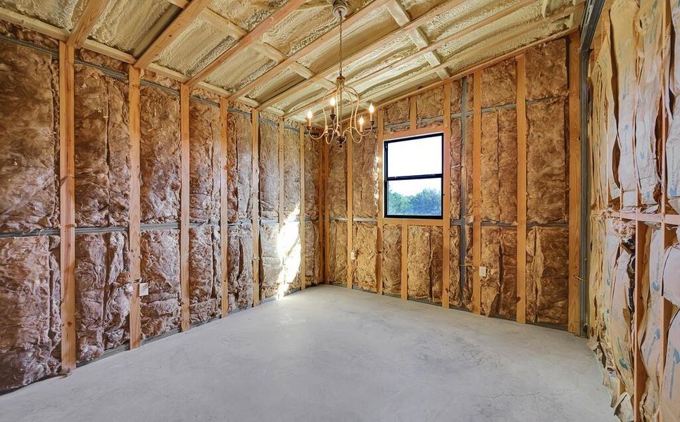 Miscellaneous room with a chandelier Miscellaneous room with a chandelier