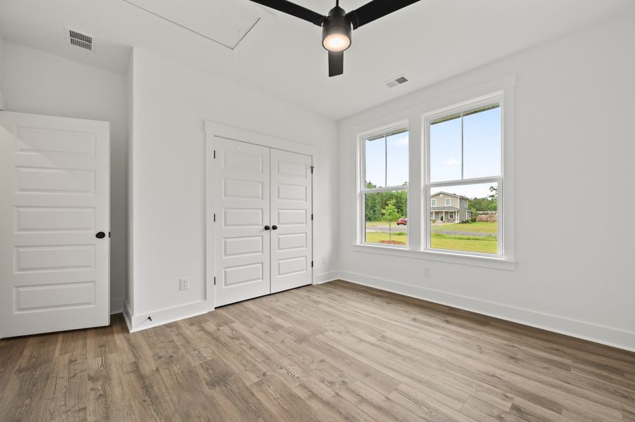 Representative unfurnished interior of a home built from the Fischer by Hunter Quinn Homes in Beaufort County Homes, Beaufort (Image 20). Representative unfurnished interior of a home built from the Fischer by Hunter Quinn Homes in Beaufort County Homes, Beaufort (Image 20).