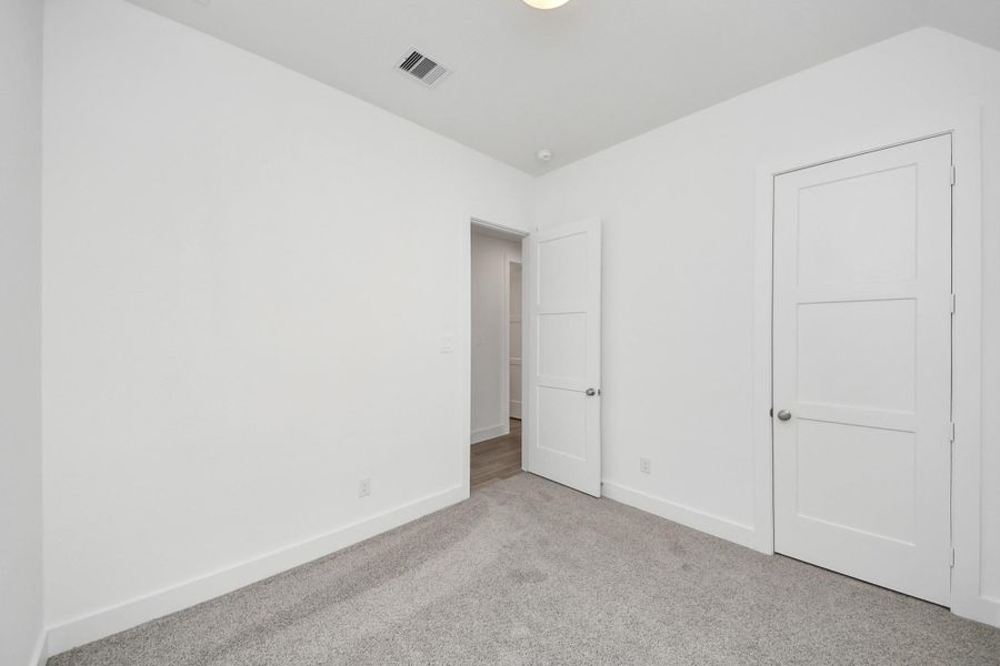 Spacious, unfurnished interior of a new home in Arabella on the Prairie: Premier Collection, Richmond (Image 9). Spacious, unfurnished interior of a new home in Arabella on the Prairie: Premier Collection, Richmond (Image 9).