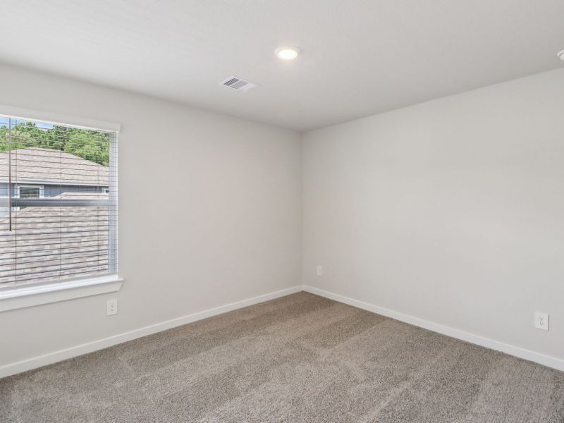 Spacious, unfurnished interior of a new home in Granger Pointe - Traditional Series, Conroe (Image 14). Spacious, unfurnished interior of a new home in Granger Pointe - Traditional Series, Conroe (Image 14).