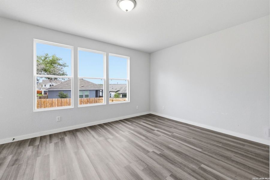 Spacious, unfurnished interior of a new home in The Meadows at Hunters Ranch, San Antonio (Image 33).
