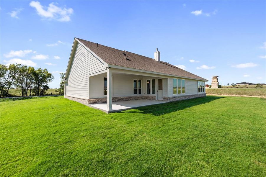 Exterior details and patio area of a home in Fairview Meadows, Rhome (Image 2). Exterior details and patio area of a home in Fairview Meadows, Rhome (Image 2).