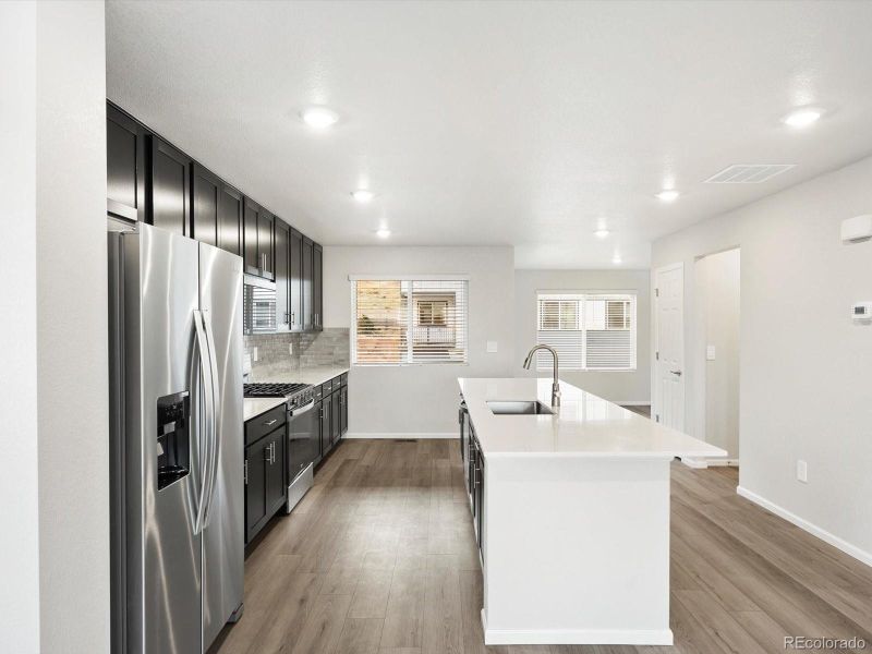 Furnished interior view inside a new home in Three Hills, Morrison (Image 6).