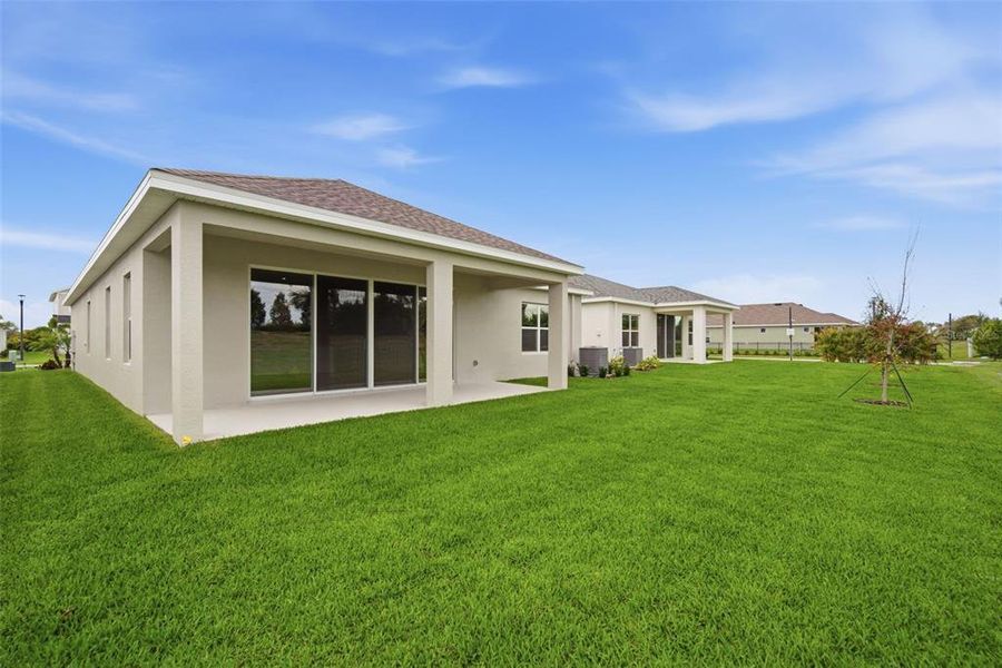 Exterior details and patio area of a home in North River Ranch, Parrish (Image 25).