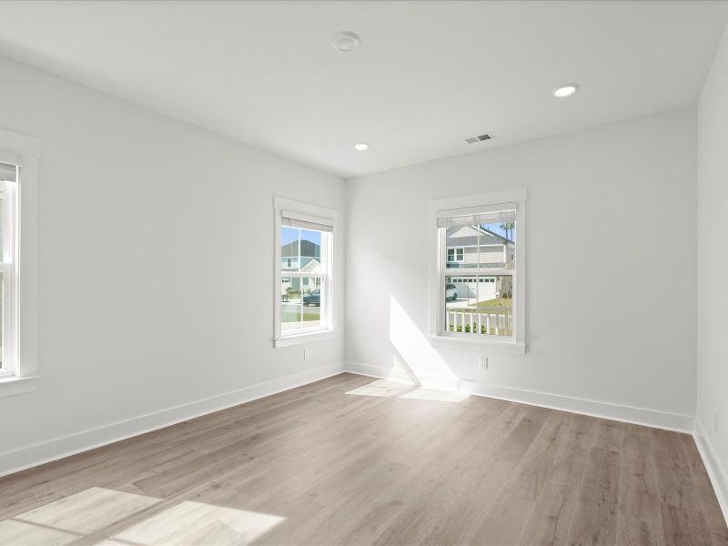 Spacious, unfurnished interior of a new home in The Coves at Lakes of Cane Bay, Summerville (Image 16). Spacious, unfurnished interior of a new home in The Coves at Lakes of Cane Bay, Summerville (Image 16).