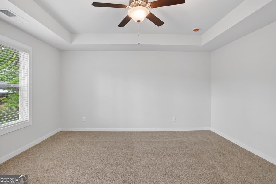 Spacious, unfurnished interior of a new home in The Fairways at Mirror Lake, Villa Rica (Image 35).