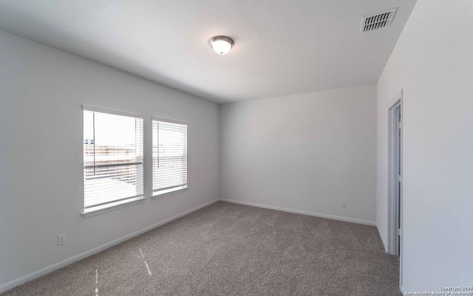 Spacious, unfurnished interior of a new home in Red Hawk Landing, San Antonio (Image 13).