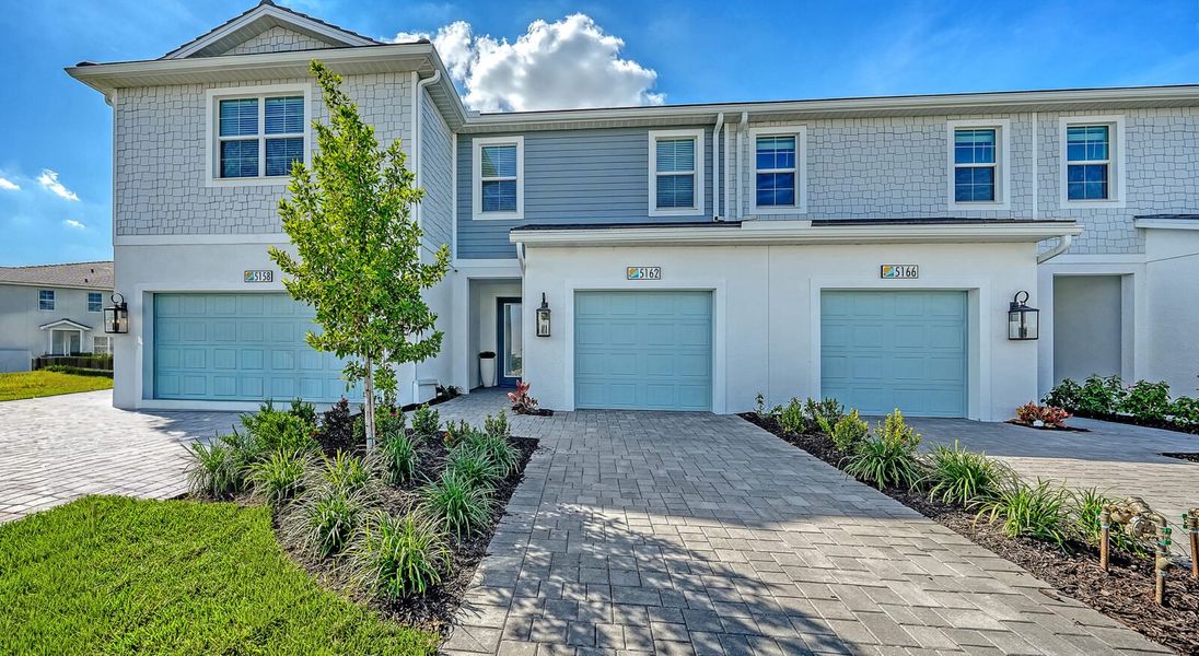 Representative exterior photo of a completed home built from the Avery by Neal Communities in SkySail, Naples, FL (Image 21).