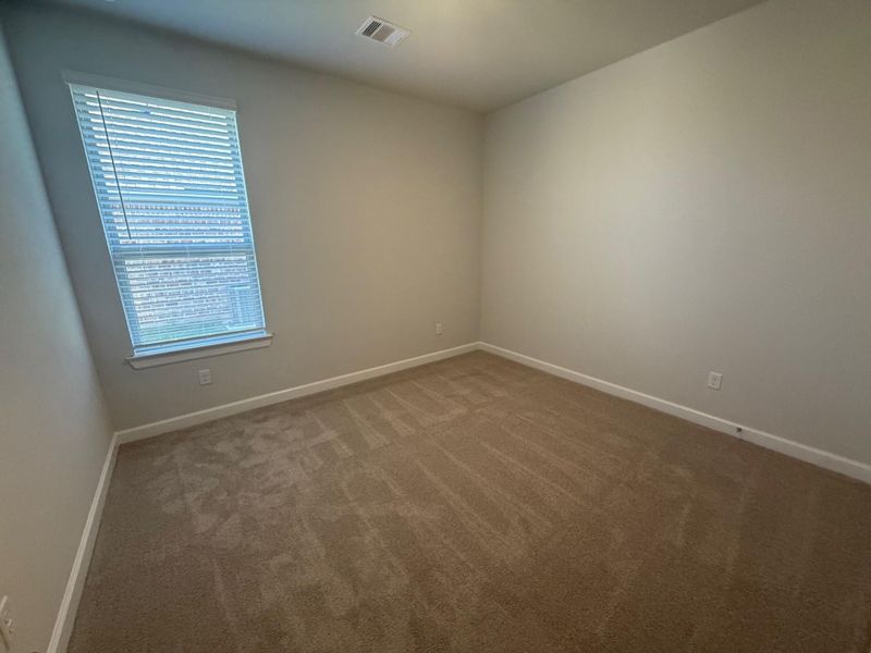 Spacious, unfurnished interior of a new home in Wellborn Settlement, College Station (Image 13).