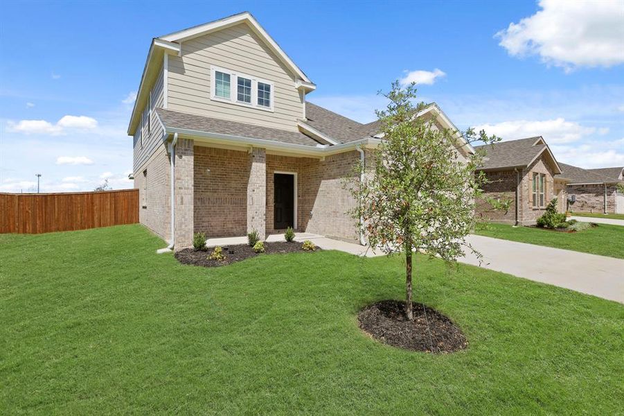 Front exterior of a new home in Burgess Meadows, Cleburne, TX, highlighting curb appeal (Image 13). Front exterior of a new home in Burgess Meadows, Cleburne, TX, highlighting curb appeal (Image 13).