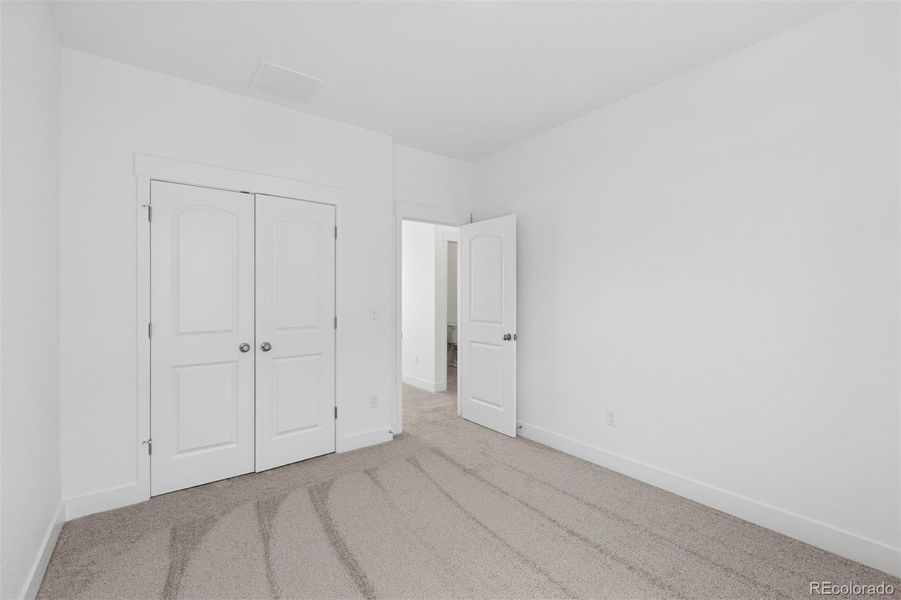 Spacious, unfurnished interior of a new home in Painted Prairie Cottage, Aurora (Image 27).