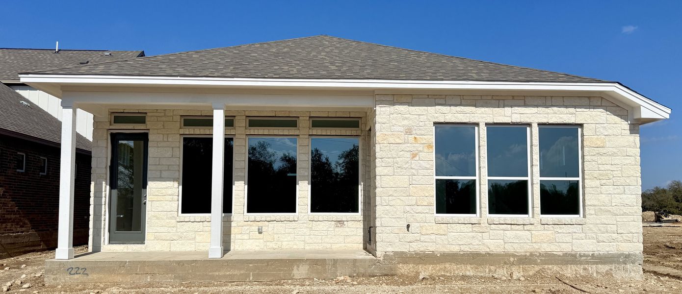 Exterior details and patio area of a home in Persimmon, Buda (Image 4). Exterior details and patio area of a home in Persimmon, Buda (Image 4).