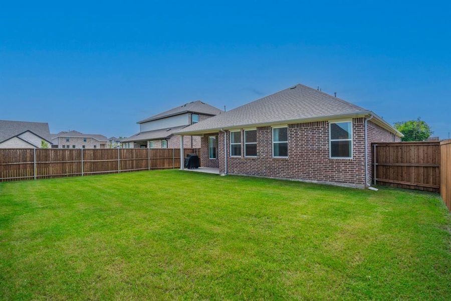 Exterior details and patio area of a home in Devonshire, Forney (Image 24). Exterior details and patio area of a home in Devonshire, Forney (Image 24).