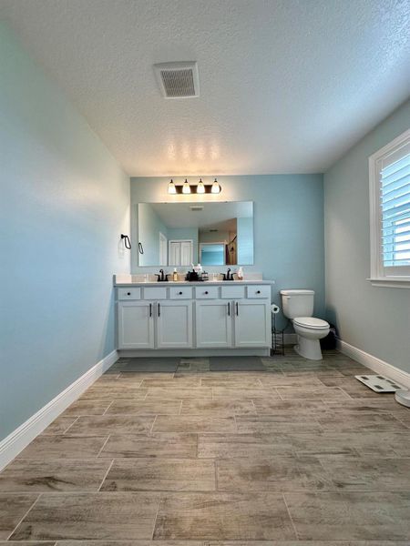 Furnished interior view inside a new home in , Port St. Lucie (Image 13).