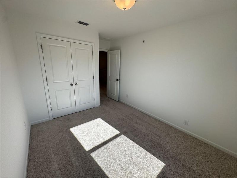 Spacious, unfurnished interior of a new home in Laurelwood, Douglasville (Image 21).