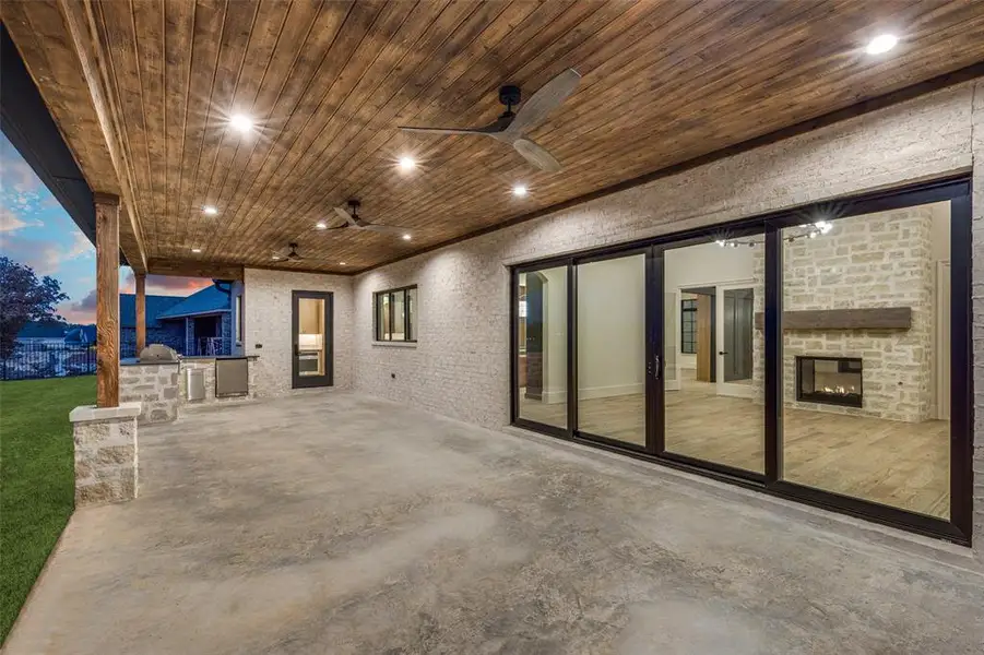 Exterior details and patio area of a home in , Denton (Image 4).