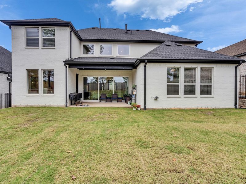 Exterior details and patio area of a home in , Conroe (Image 4). Exterior details and patio area of a home in , Conroe (Image 4).