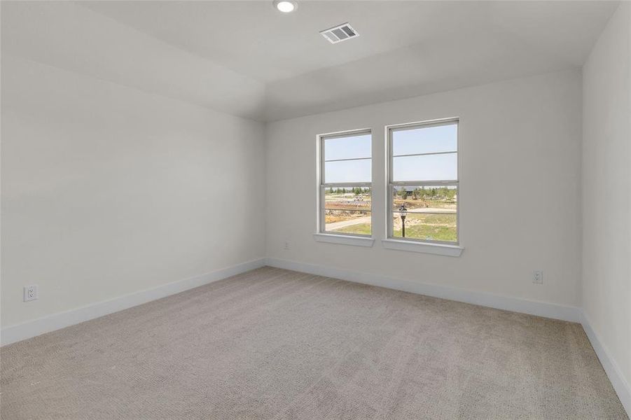 Neutral-toned carpeting paired with white walls